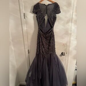 Brand new never worn gray evening gown with beads and rhinestones.
